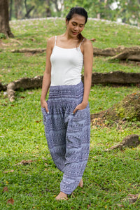 Gray printed rayon pants with elastic waistband and relaxed ankle-length fit