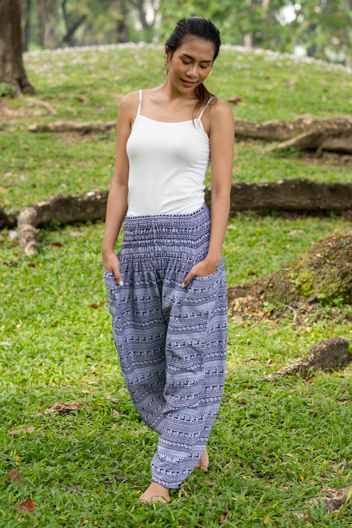 Gray printed rayon pants with elastic waistband and relaxed ankle-length fit