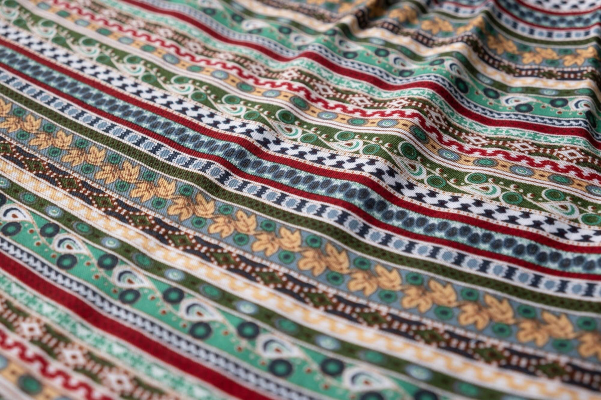 Multicolor striped rayon fabric with ornate boho motifs